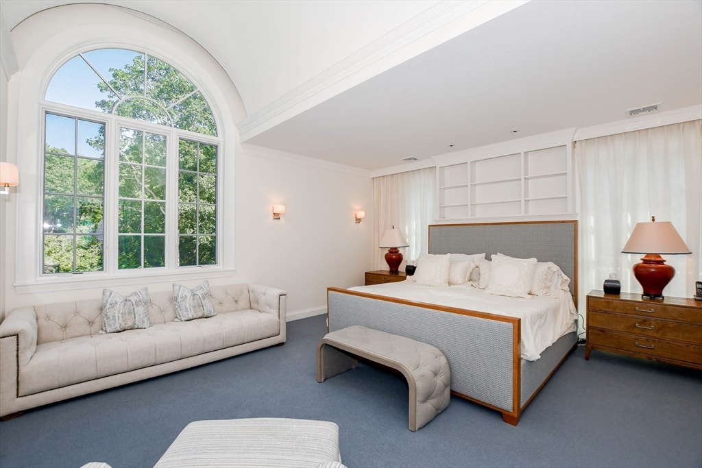 85 Moorings Road Marion, MA 02738 - Photo 18 of 37 a bedroom with a bed couch and a large window