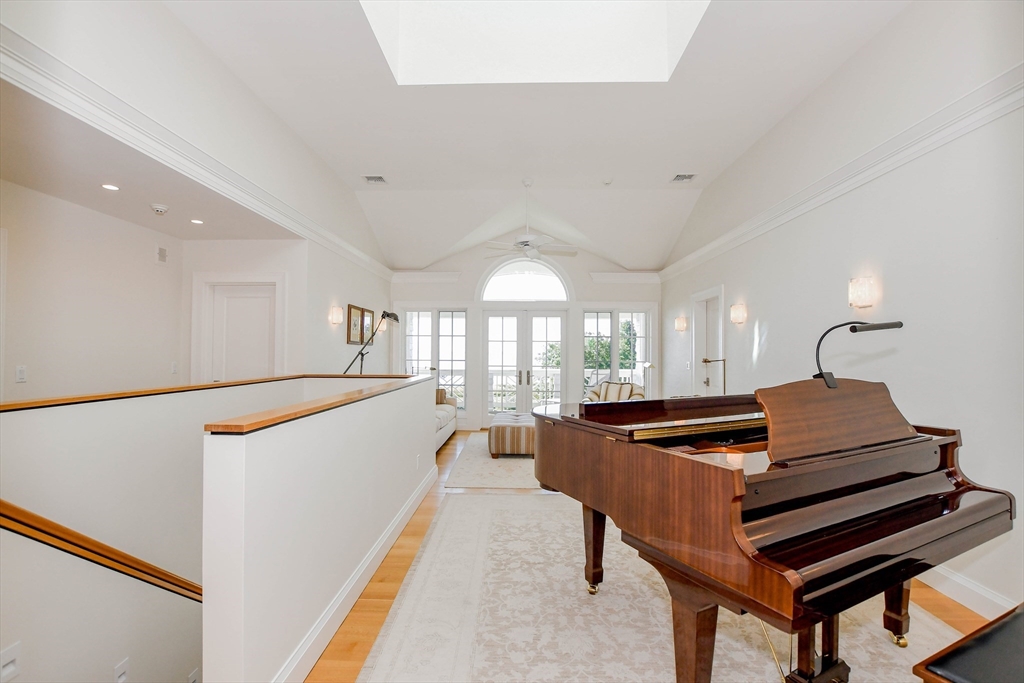 85 Moorings Road Marion, MA 02738 - Photo 20 of 37 a living room with furniture and a piano