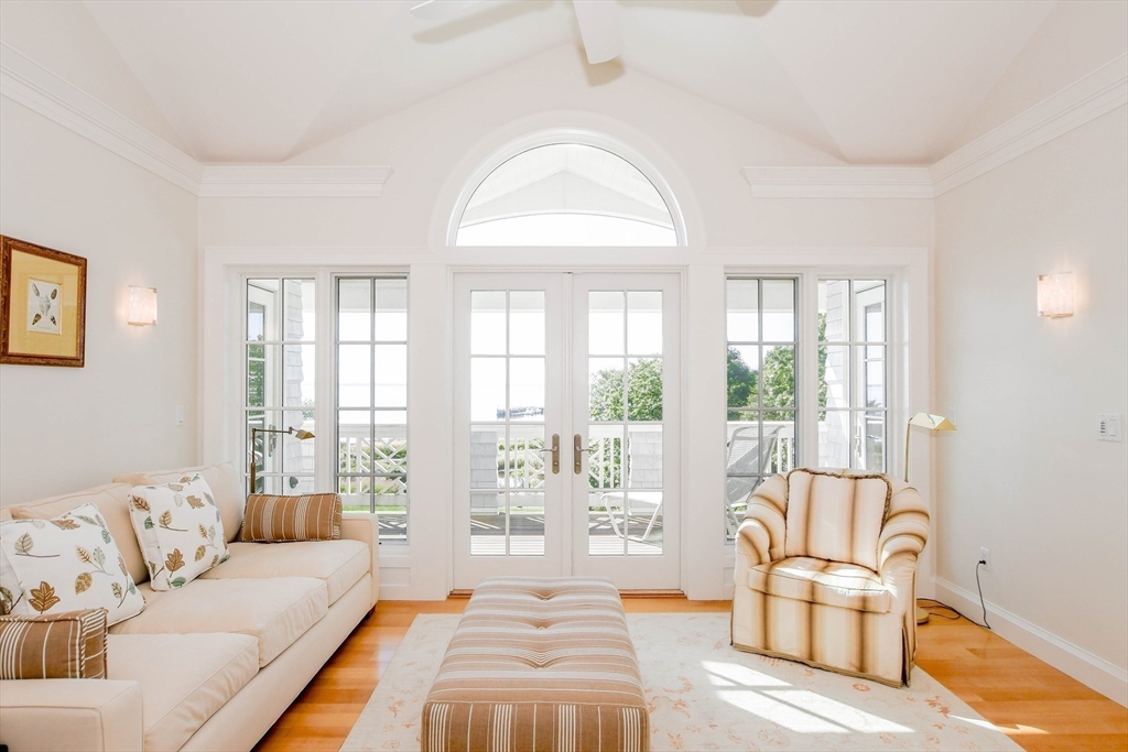 85 Moorings Road Marion, MA 02738 - Photo 21 of 37 a spacious bedroom with a bed and glass window