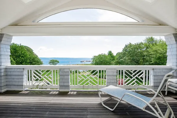a view of balcony with furniture