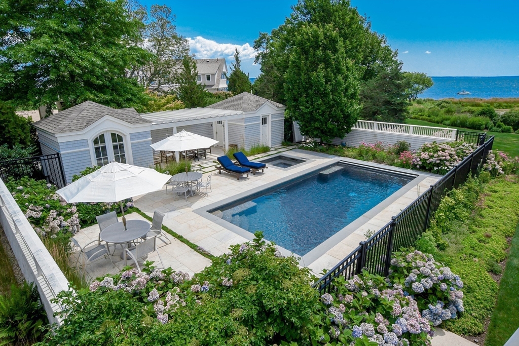 85 Moorings Road Marion, MA 02738 - Photo 25 of 37 an aerial view of a house with yard patio and outdoor seating