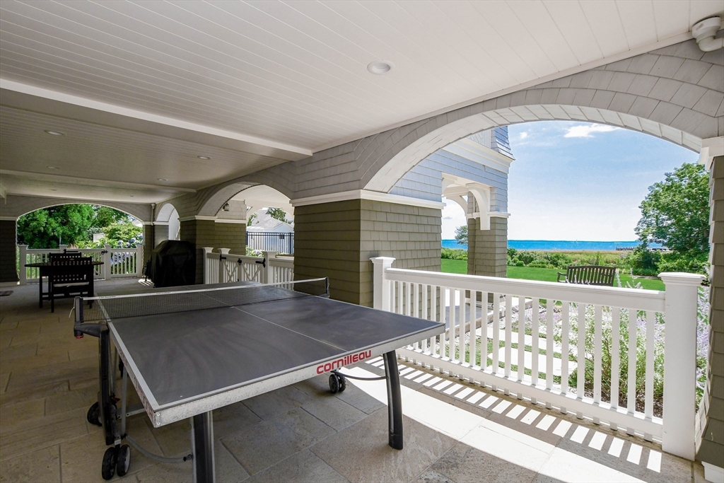 85 Moorings Road Marion, MA 02738 - Photo 33 of 37 a view of a porch with furniture