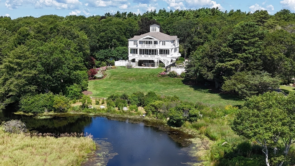85 Moorings Road Marion, MA 02738 - Photo 37 of 37 a front view of a house with a yard