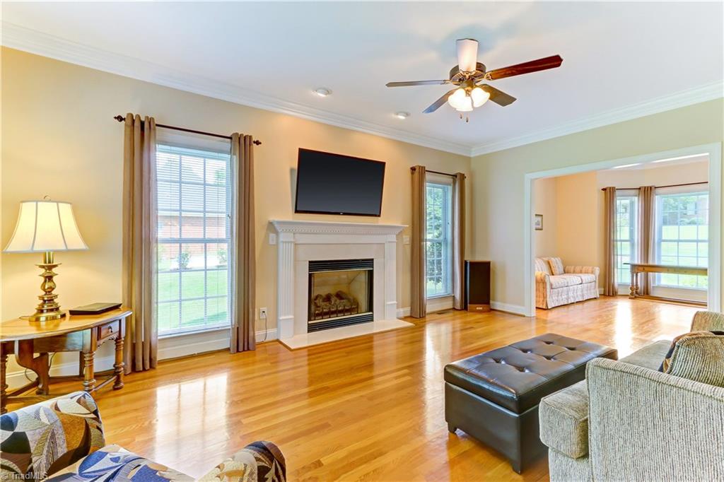 6703 Fegan Road Summerfield, NC 27358 - Photo 9 of 30 This home has been meticulously maintained. Gleaming hardwood floors, neutral decor.