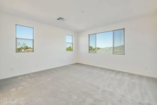 an empty room with windows