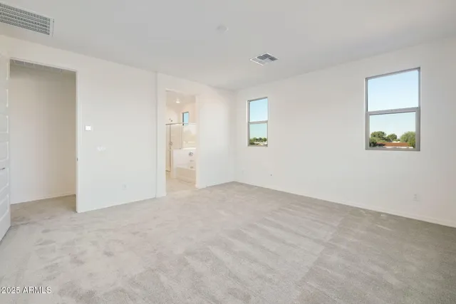 a view of an empty walk in closet