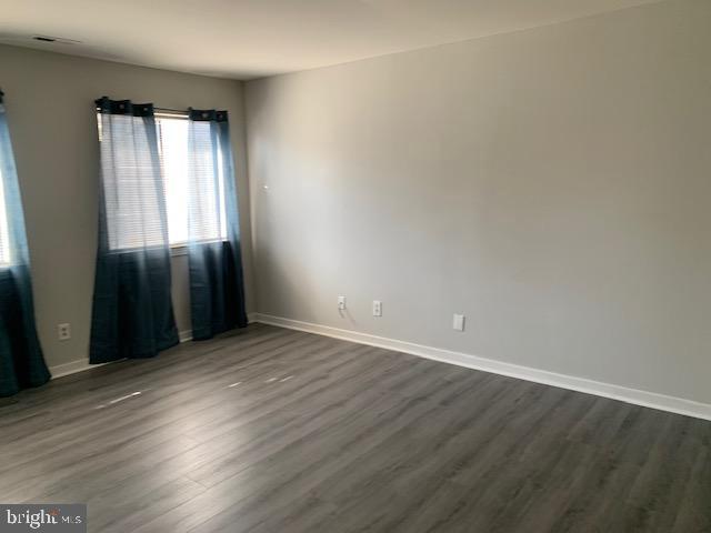 805 Augusta Circle Mount Laurel, NJ 08054 - Photo 10 of 24 an empty room with wooden floor and windows