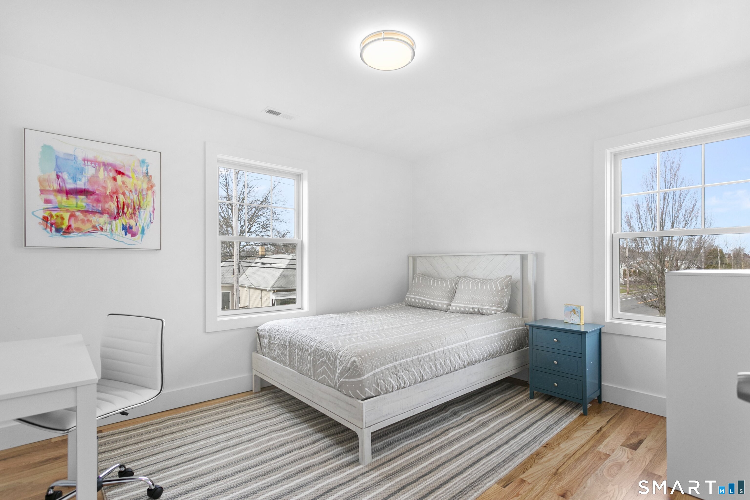 12 Sandy Way Fairfield, CT 06824 - Photo 21 of 33 a bedroom with a large bed and a window