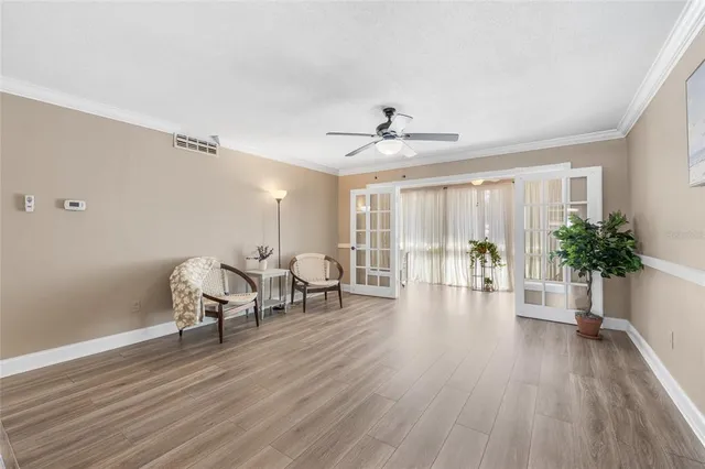 a workspace with furniture and a potted plant