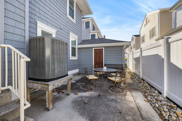 a front view of a house with parking space