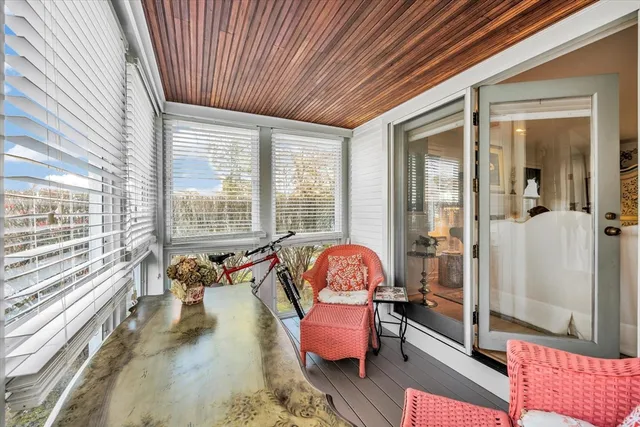 a bedroom with bed and window