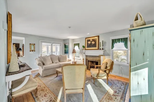 a view of a dining room with furniture wooden floor and chandelier