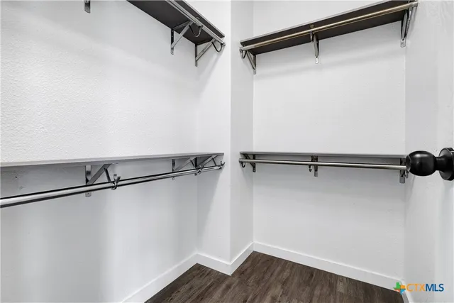 a view of a room with racks on the wall