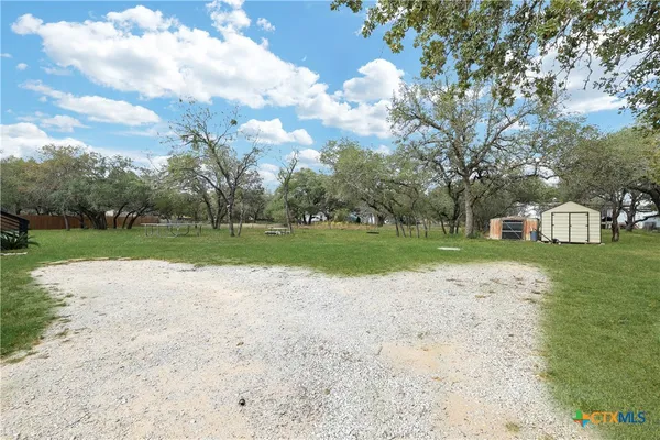 a view of a house with a big yard