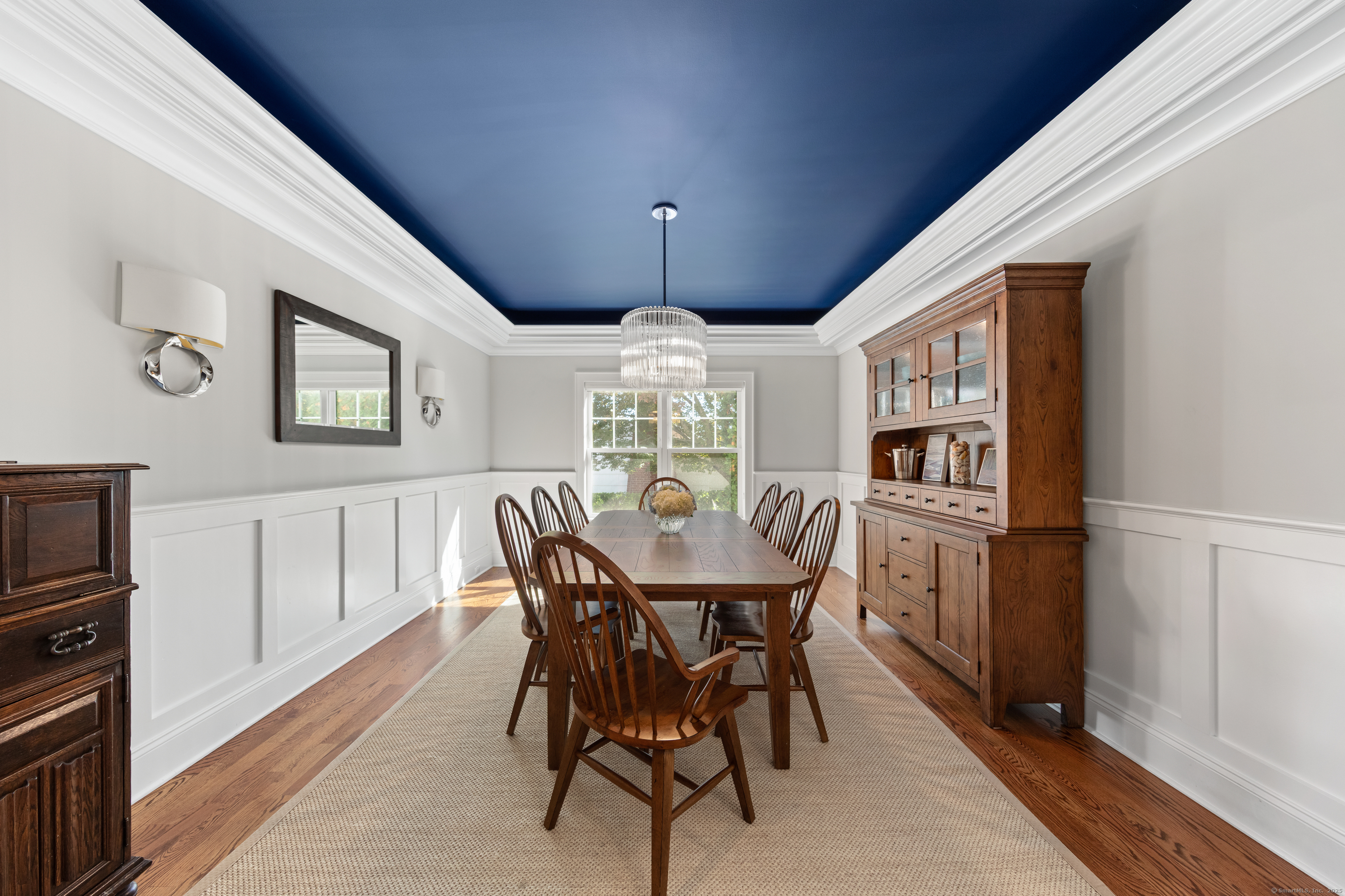 109 Jeniford Road Fairfield, CT 06824 - Photo 11 of 40 a view of a dining room with furniture window and wooden floor