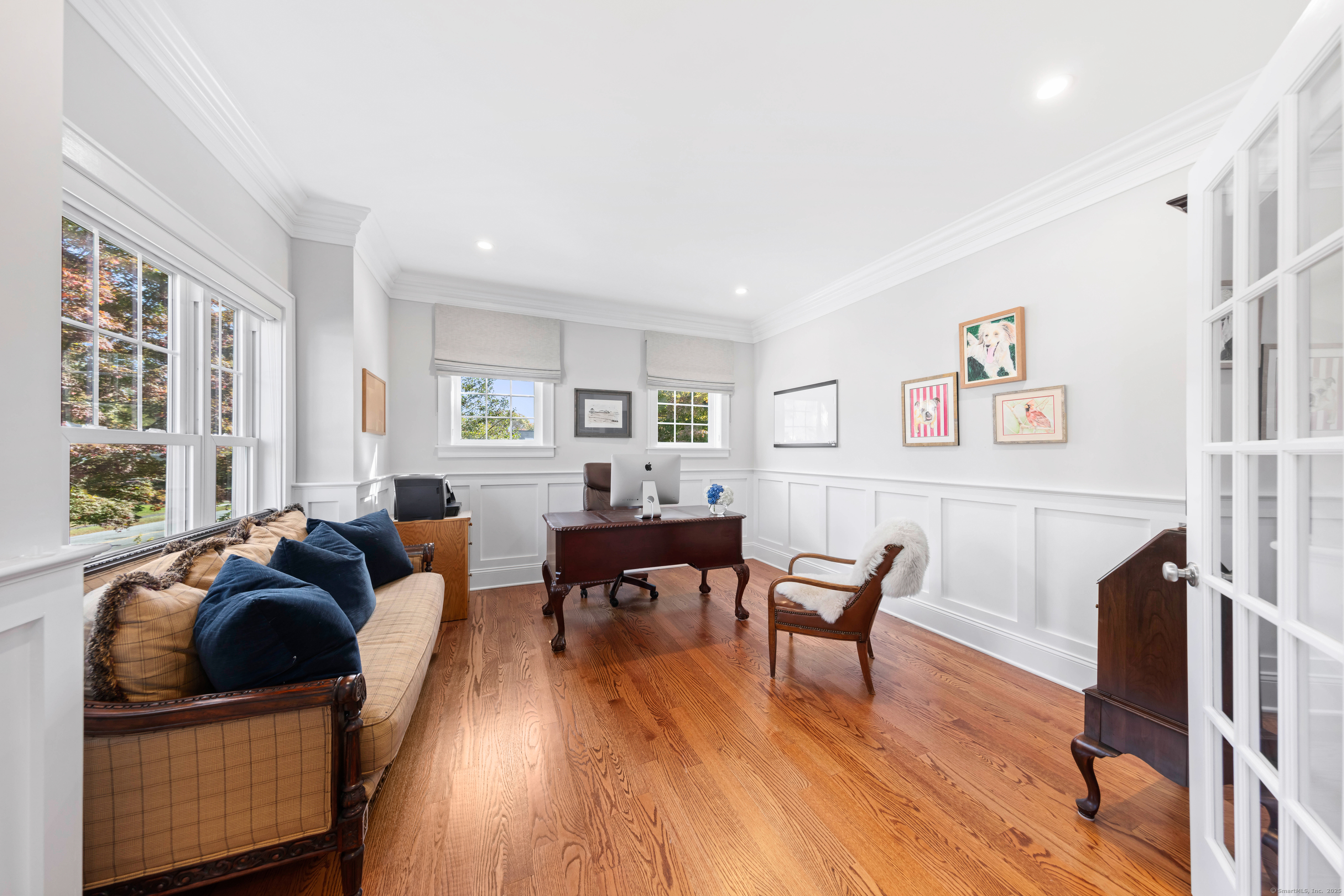 109 Jeniford Road Fairfield, CT 06824 - Photo 12 of 40 a living room with furniture and a wooden floor