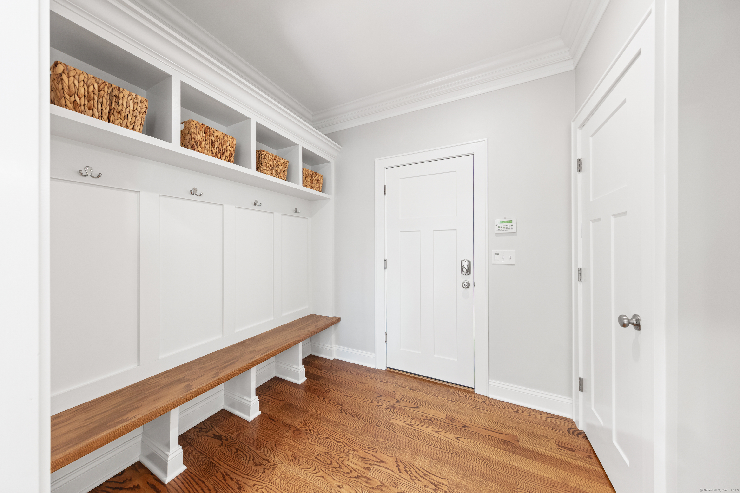 109 Jeniford Road Fairfield, CT 06824 - Photo 13 of 40 a view of an entryway with wooden floor