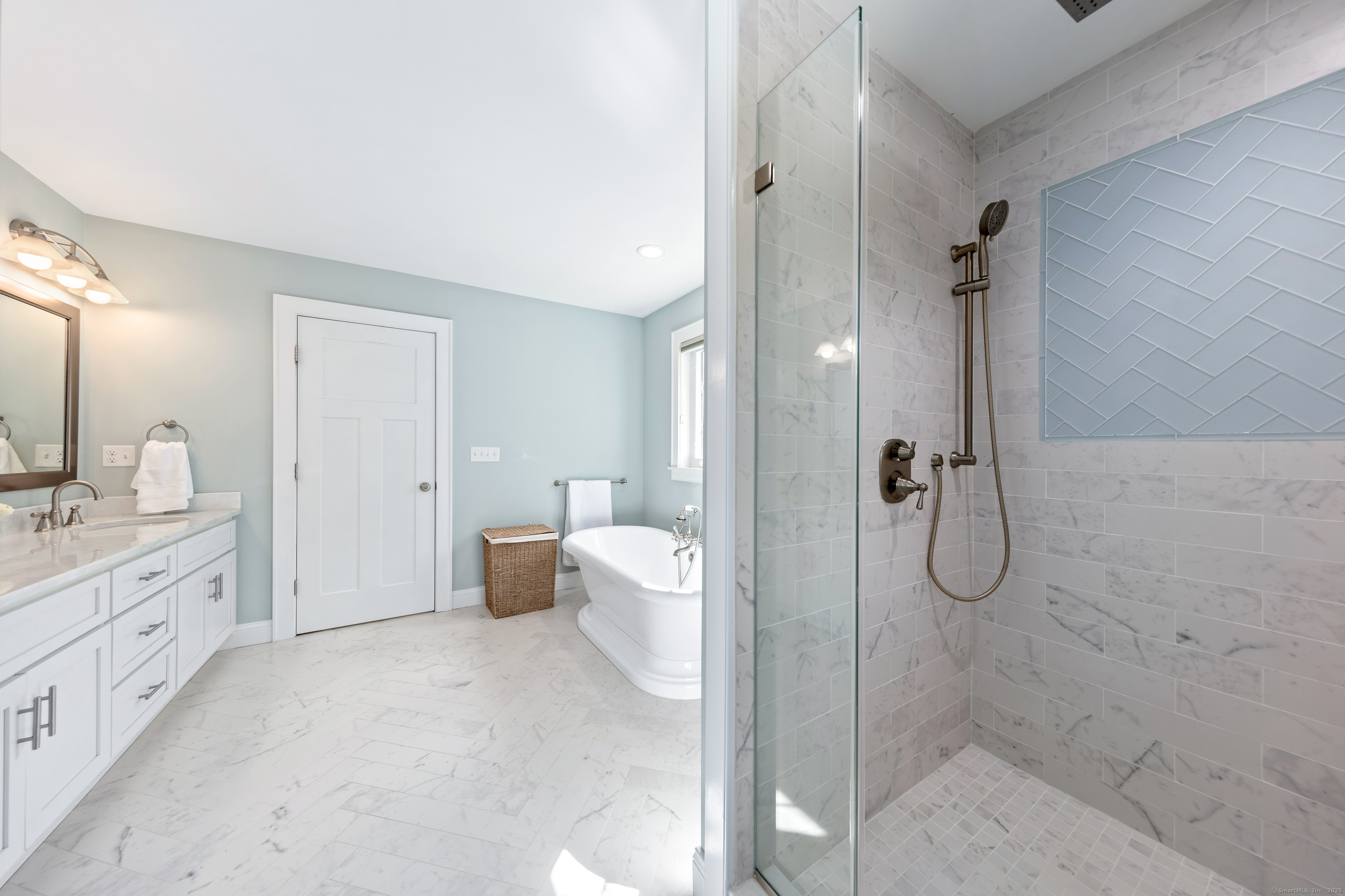 109 Jeniford Road Fairfield, CT 06824 - Photo 20 of 40 a bathroom with a double vanity sink toilet and shower