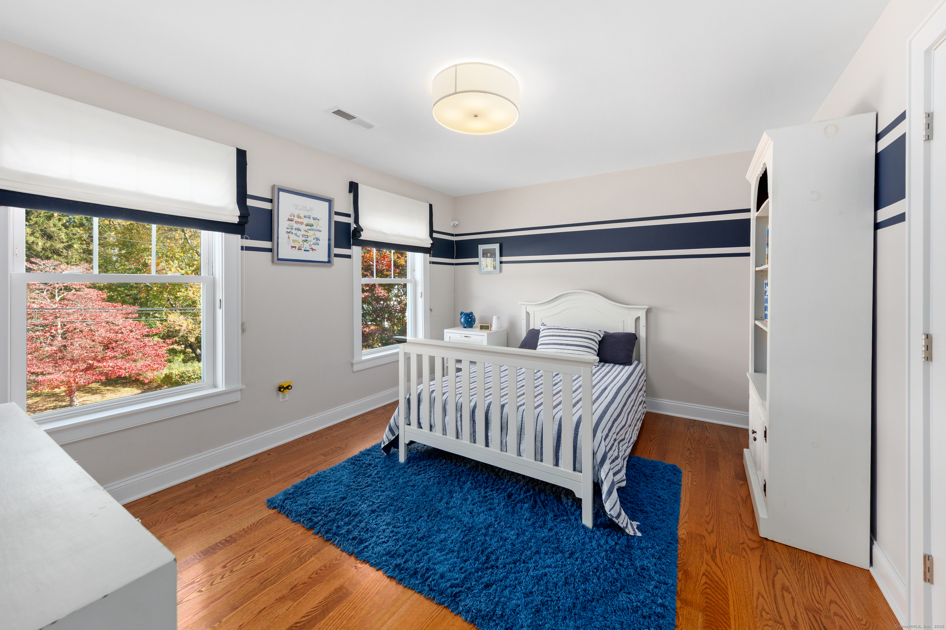 109 Jeniford Road Fairfield, CT 06824 - Photo 21 of 40 a bedroom with a bed and a window