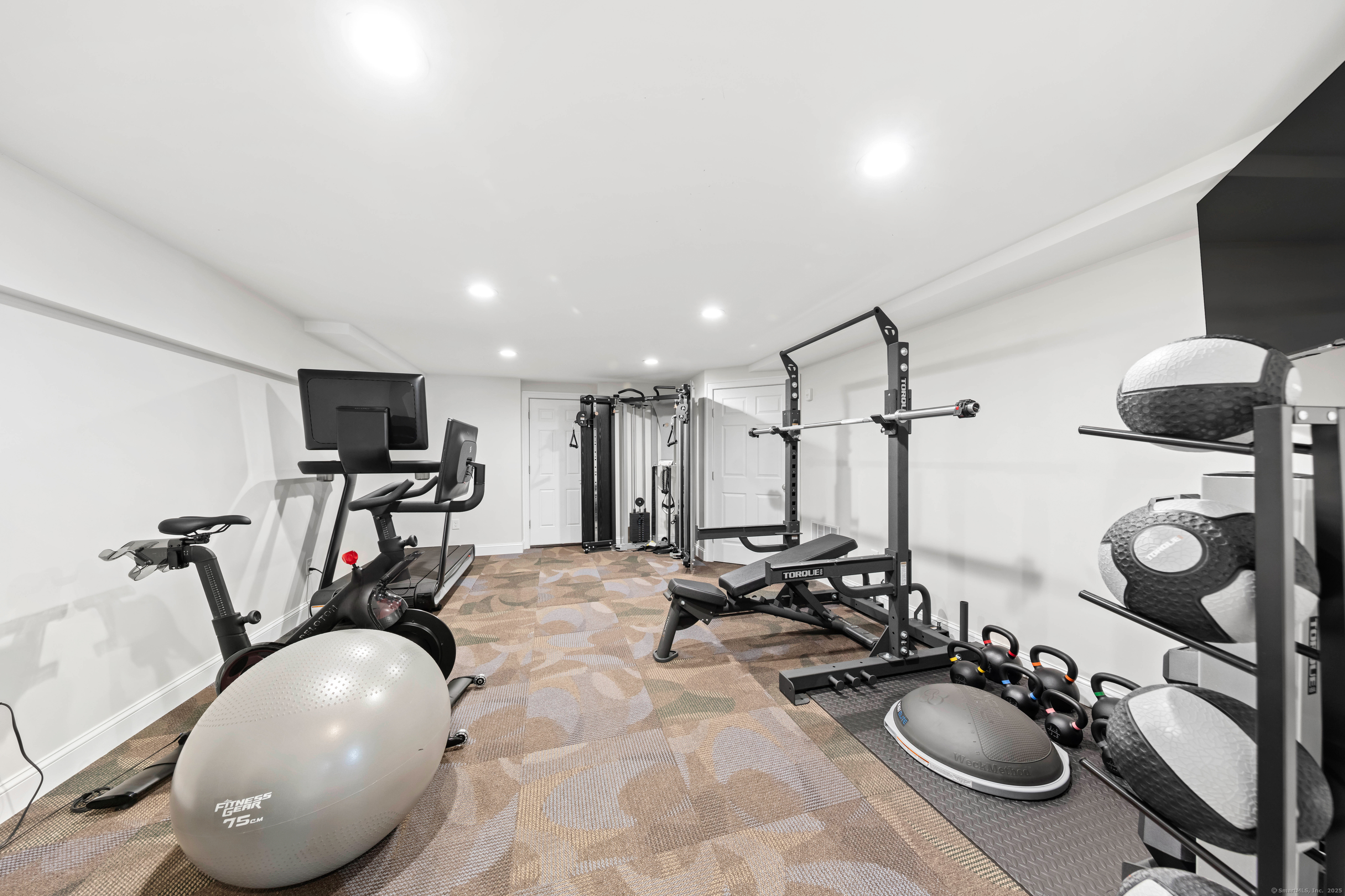 109 Jeniford Road Fairfield, CT 06824 - Photo 27 of 40 a view of a room with gym equipment