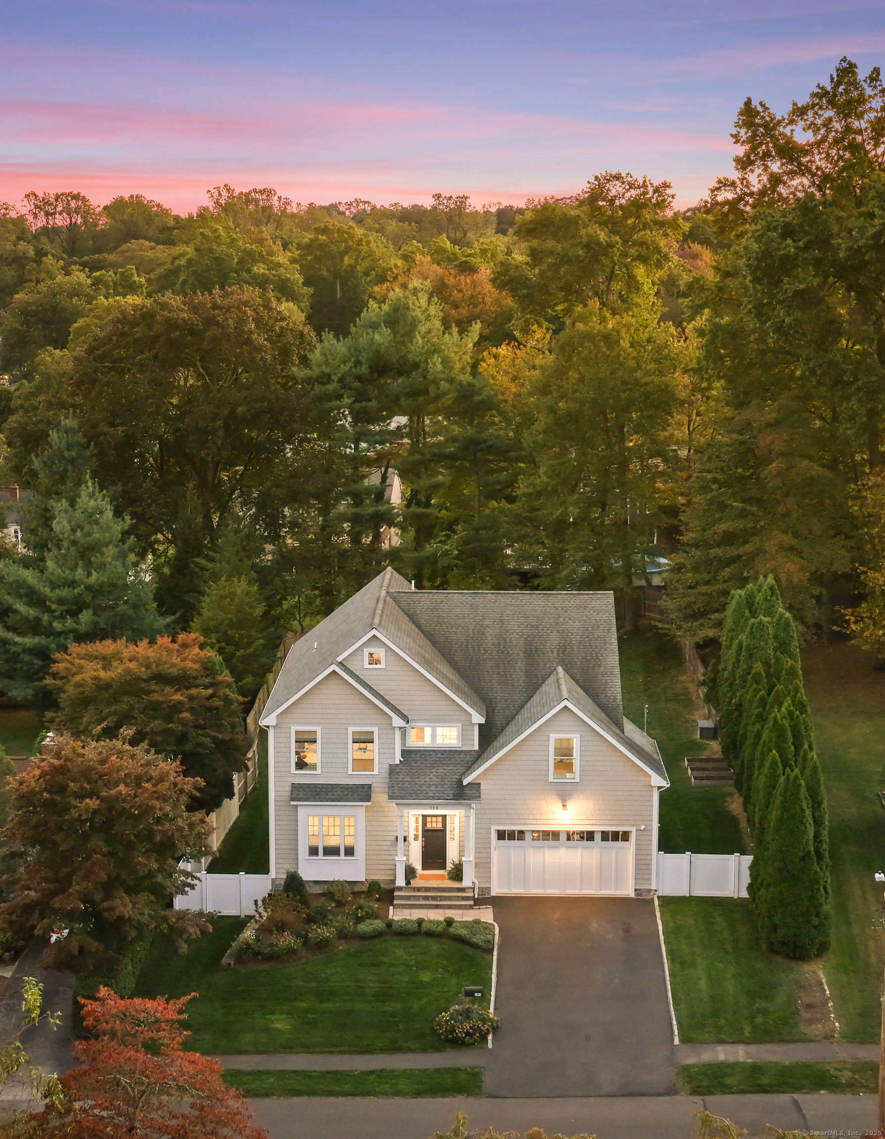 109 Jeniford Road Fairfield, CT 06824 - Photo 39 of 40 a view of a big house with a big yard and large trees