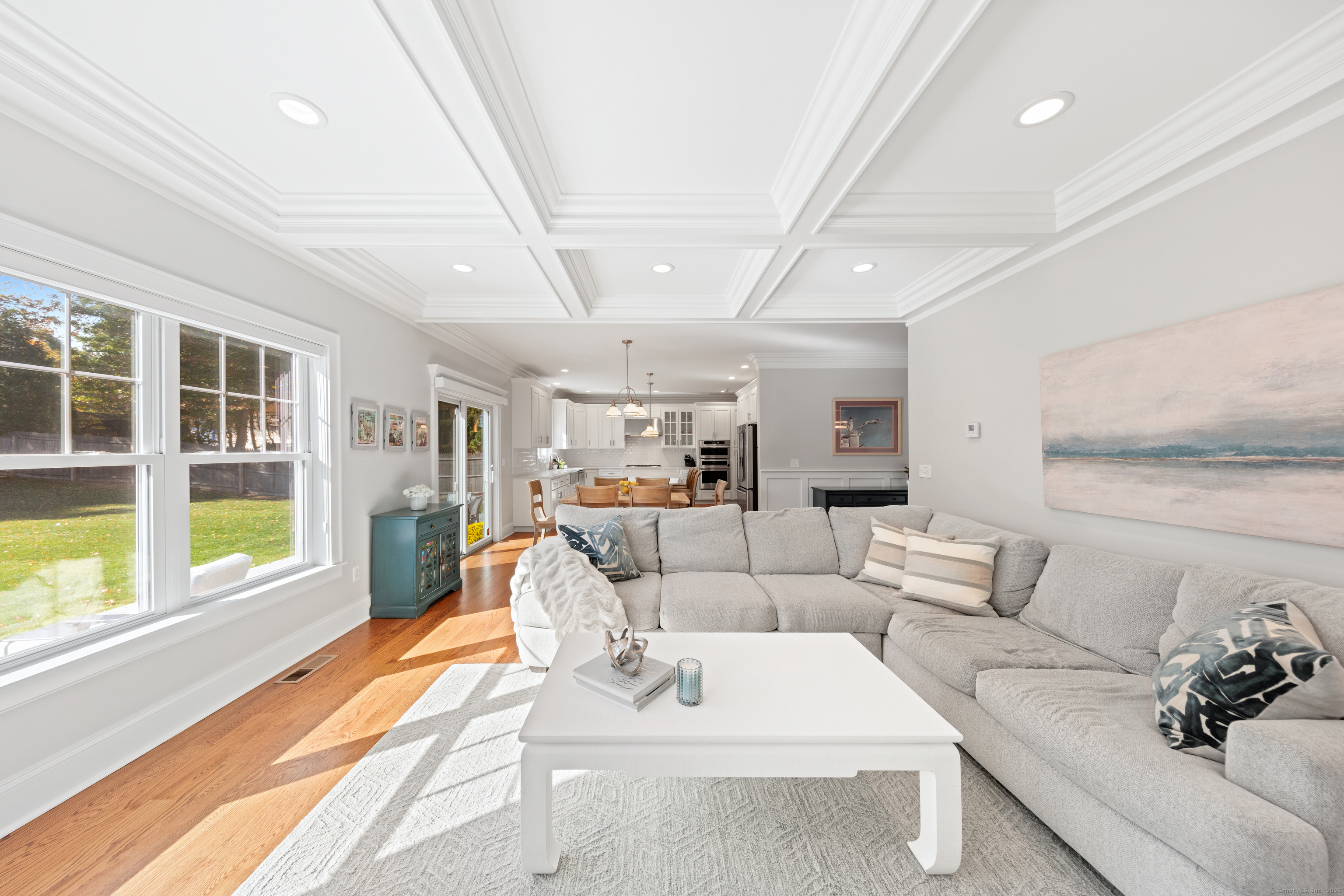 109 Jeniford Road Fairfield, CT 06824 - Photo 6 of 40 a living room with furniture and a large window