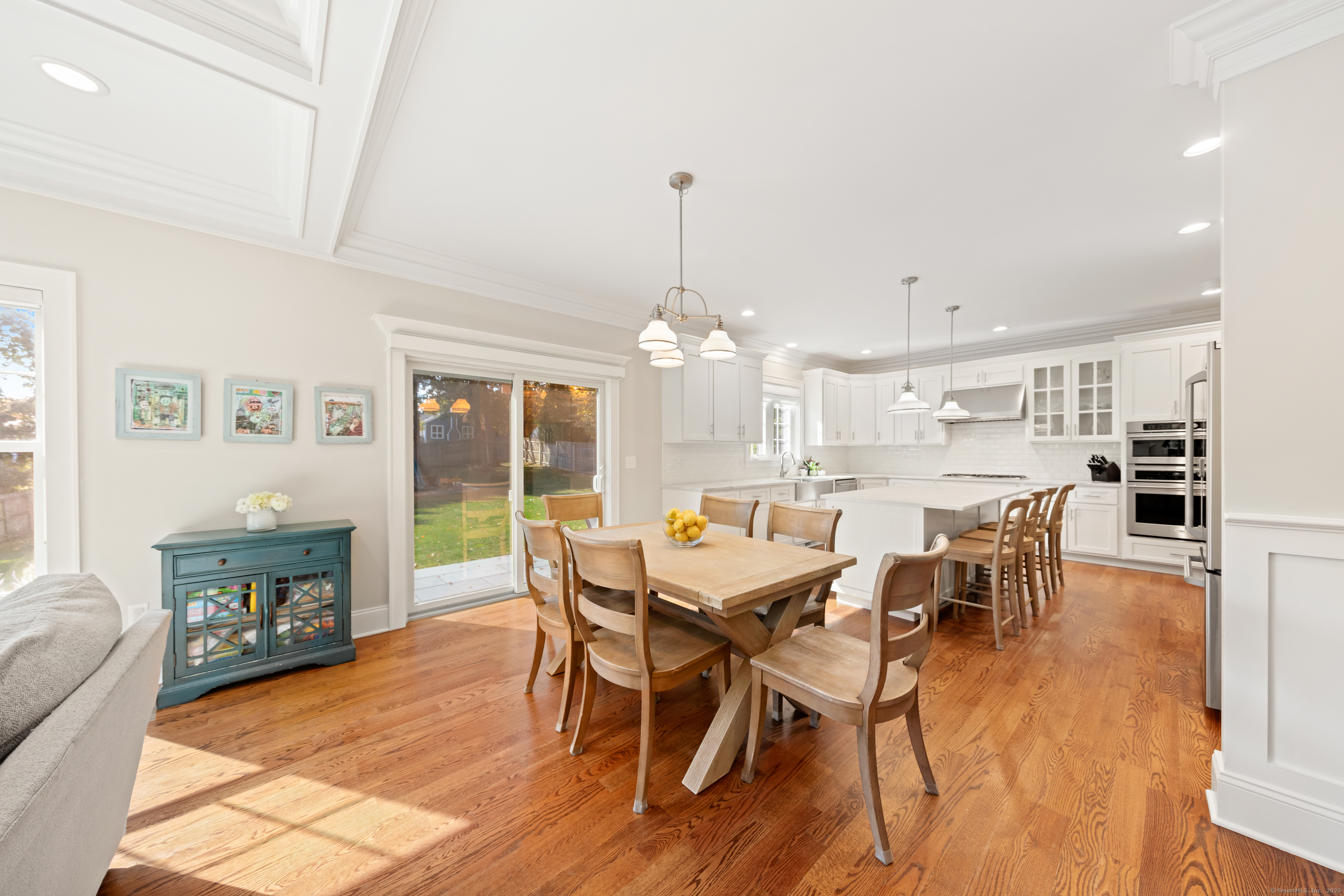 109 Jeniford Road Fairfield, CT 06824 - Photo 7 of 40 a view of a dining room with furniture window and wooden floor