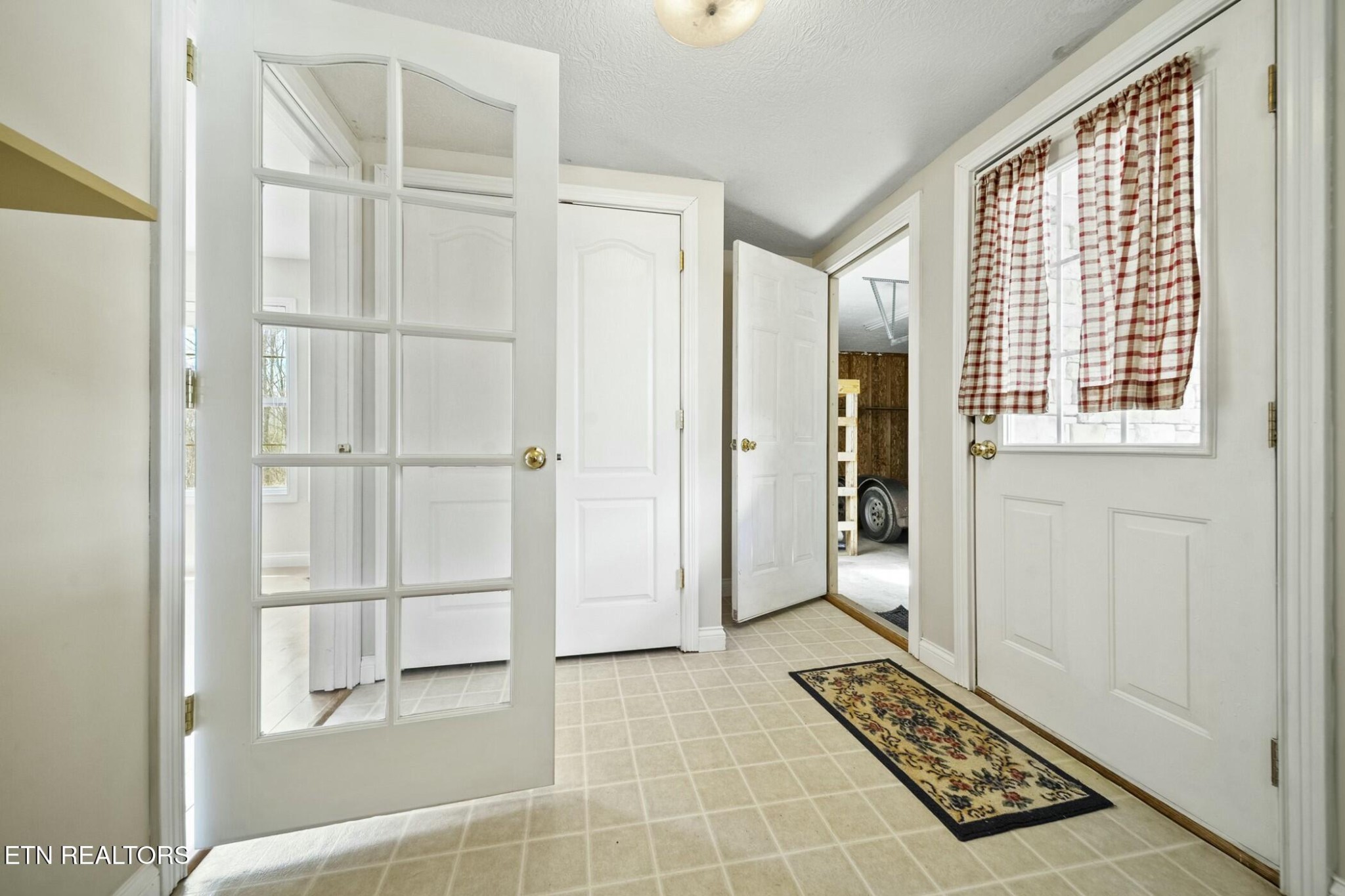8345 Cliff Ridge Court Corryton, TN 37721 - Photo 18 of 54 a bathroom with a glass shower door and a window