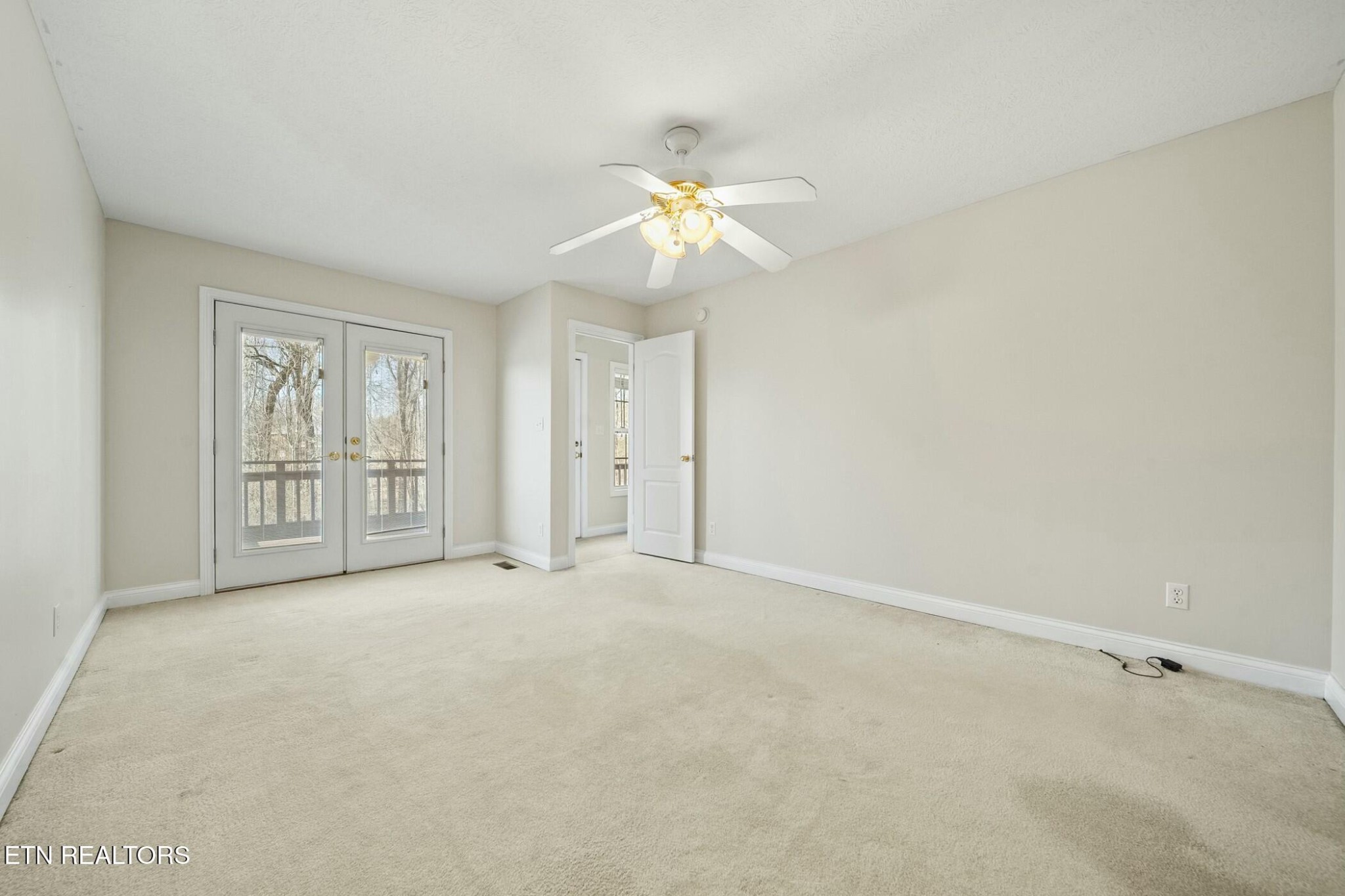 8345 Cliff Ridge Court Corryton, TN 37721 - Photo 20 of 54 wooden floor in an empty room with a window