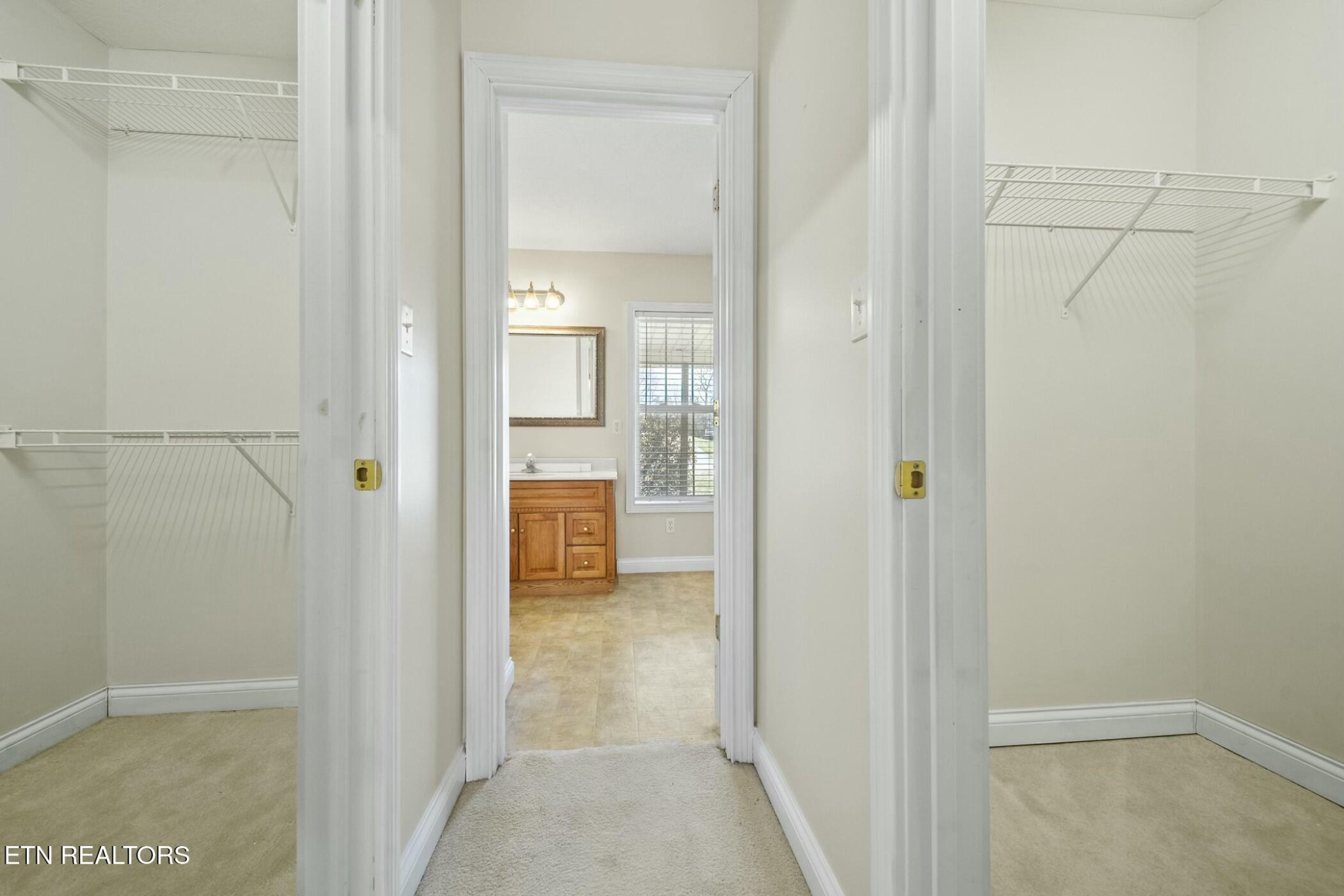 8345 Cliff Ridge Court Corryton, TN 37721 - Photo 23 of 54 a bathroom with a glass shower door