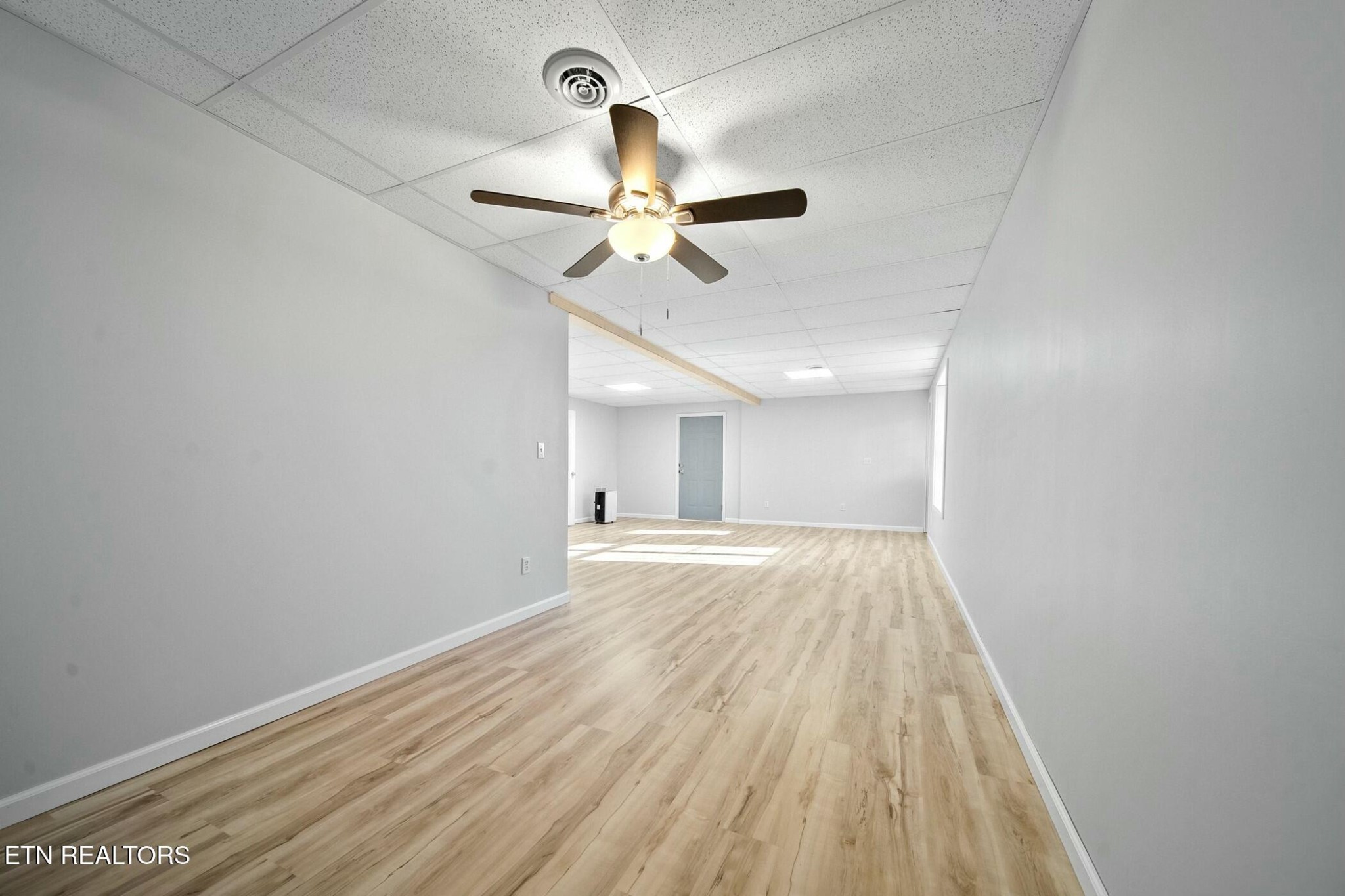 8345 Cliff Ridge Court Corryton, TN 37721 - Photo 37 of 54 wooden floor in an empty room with a window