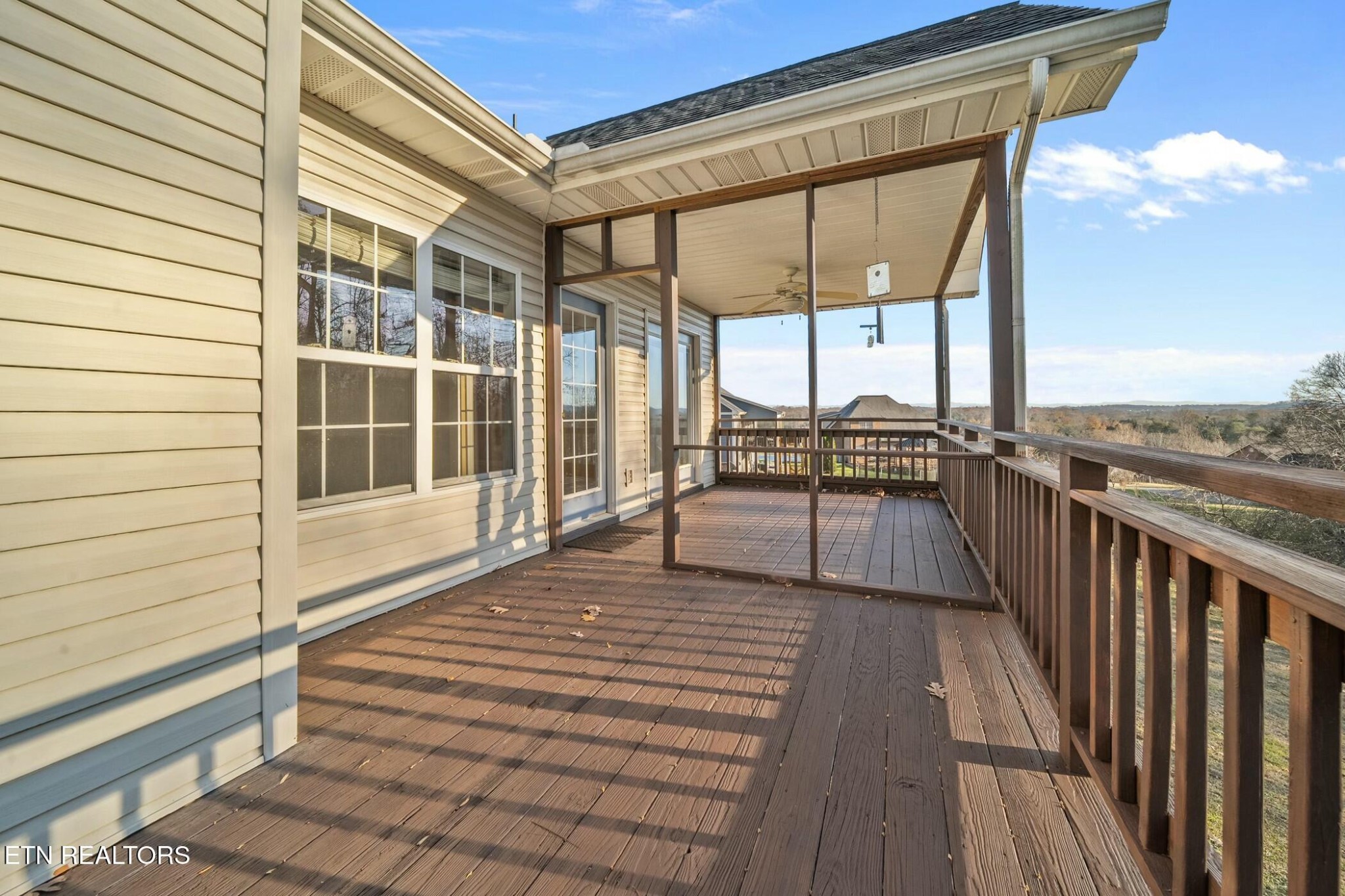 8345 Cliff Ridge Court Corryton, TN 37721 - Photo 48 of 54 a view of a balcony with floor to ceiling windows with wooden floor