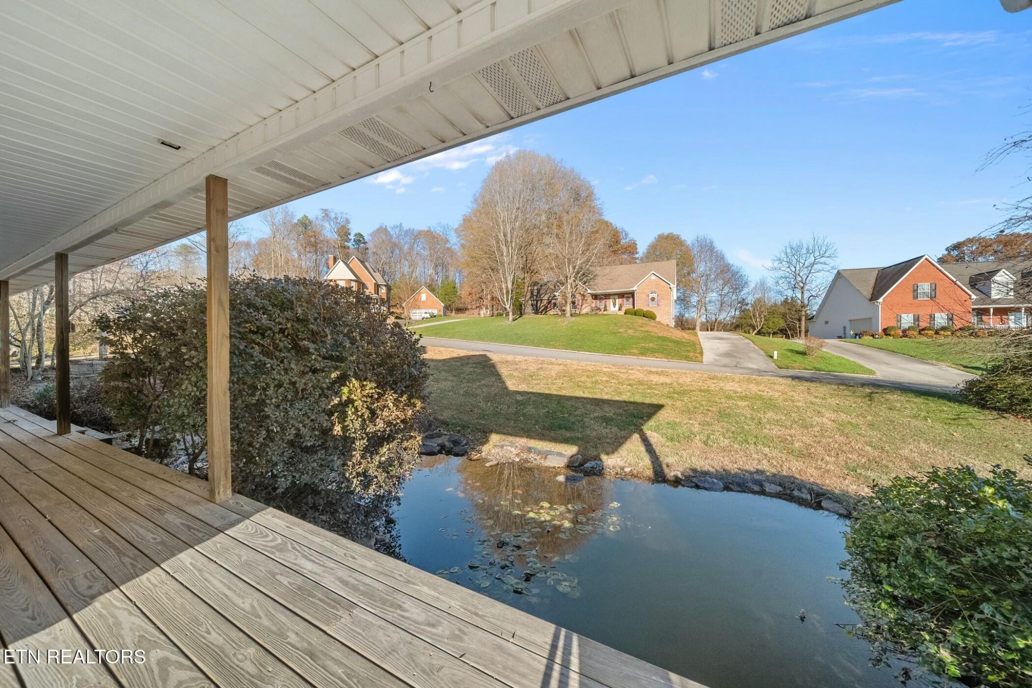 8345 Cliff Ridge Court Corryton, TN 37721 - Photo 5 of 54 a view of a lake with a mountain in the background