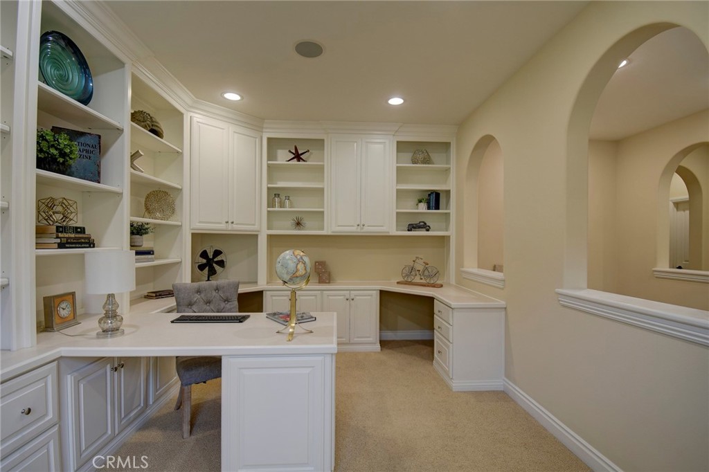 62 Gentry Irvine, CA 92620 - Photo 19 of 48 a room with stainless steel appliances kitchen island a table and chairs in it