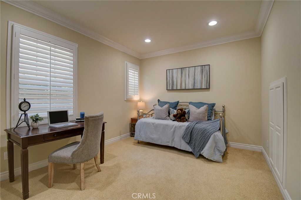 62 Gentry Irvine, CA 92620 - Photo 27 of 48 a bedroom with a bed and a desk