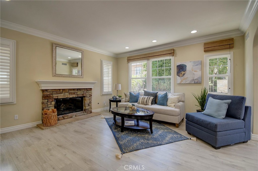 62 Gentry Irvine, CA 92620 - Photo 5 of 48 a living room with furniture and a fireplace