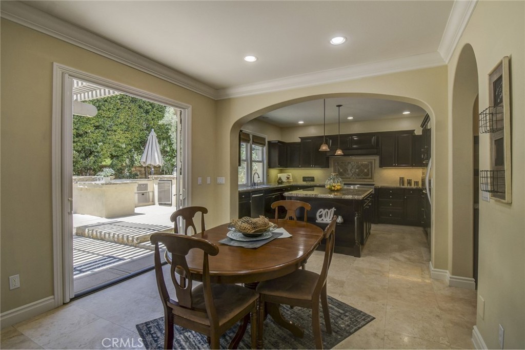 62 Gentry Irvine, CA 92620 - Photo 7 of 48 a view of a dining room with furniture and a large window