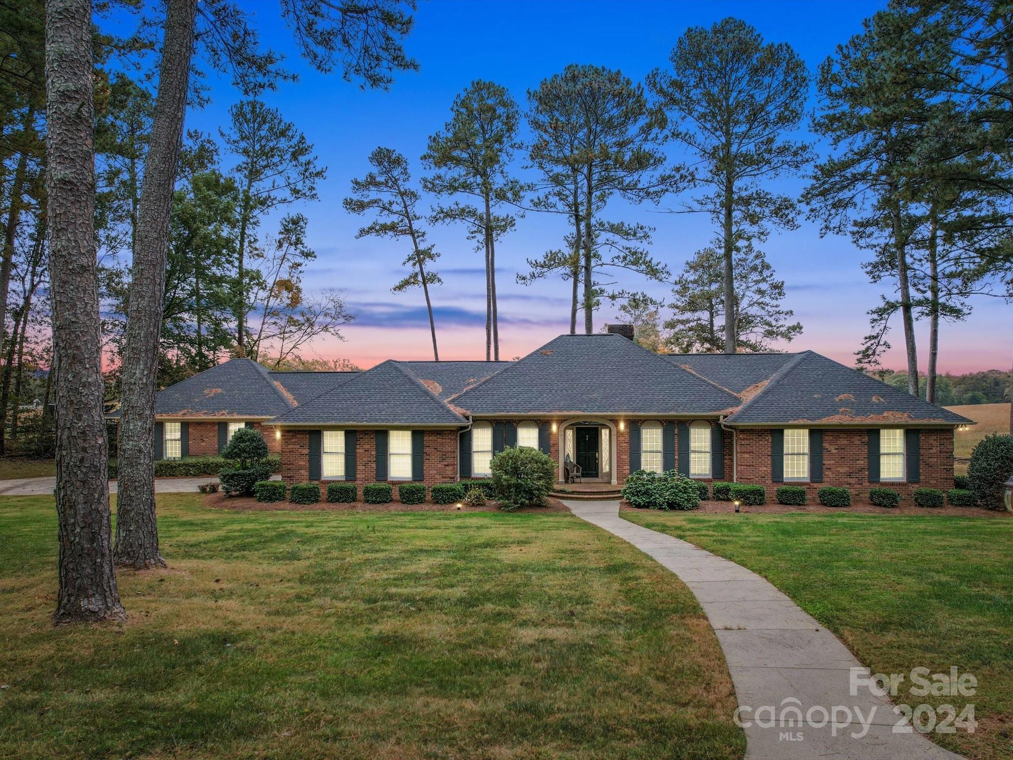 205 James Road Oakboro, NC 28129 - Photo 1 of 48 a front view of a house with garden