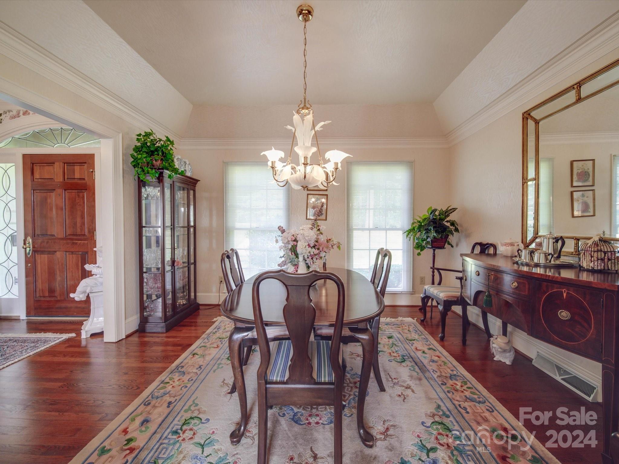 205 James Road Oakboro, NC 28129 - Photo 17 of 48 a view of a dining room with furniture and wooden floor