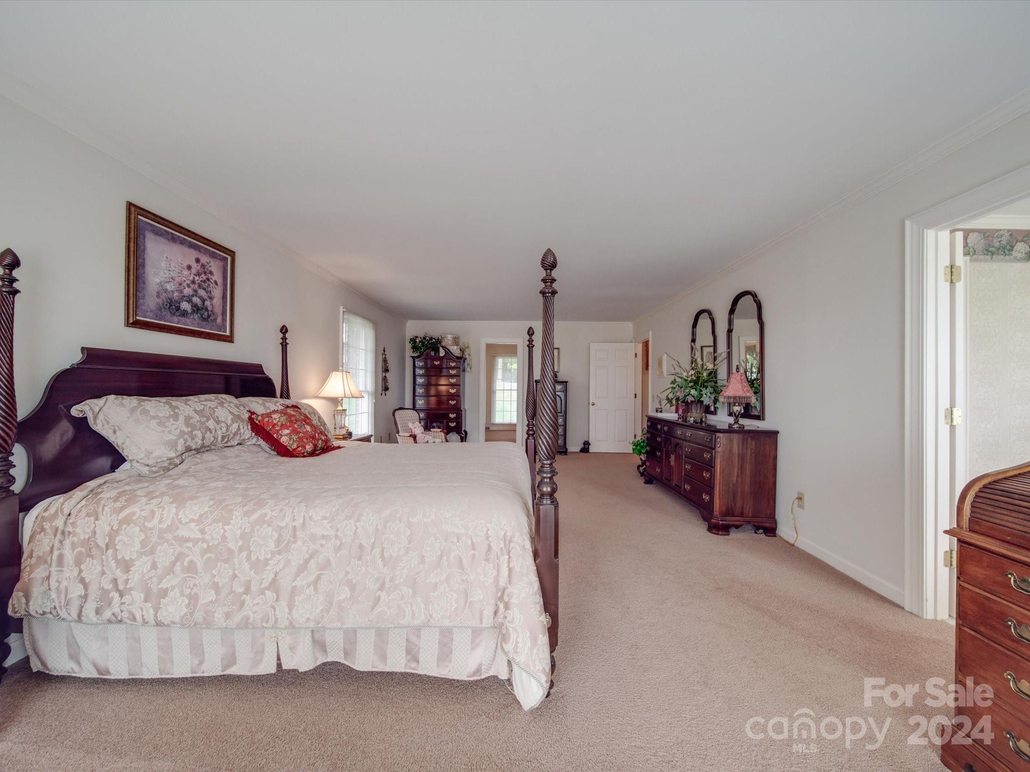 205 James Road Oakboro, NC 28129 - Photo 25 of 48 a bedroom with bed and a desk