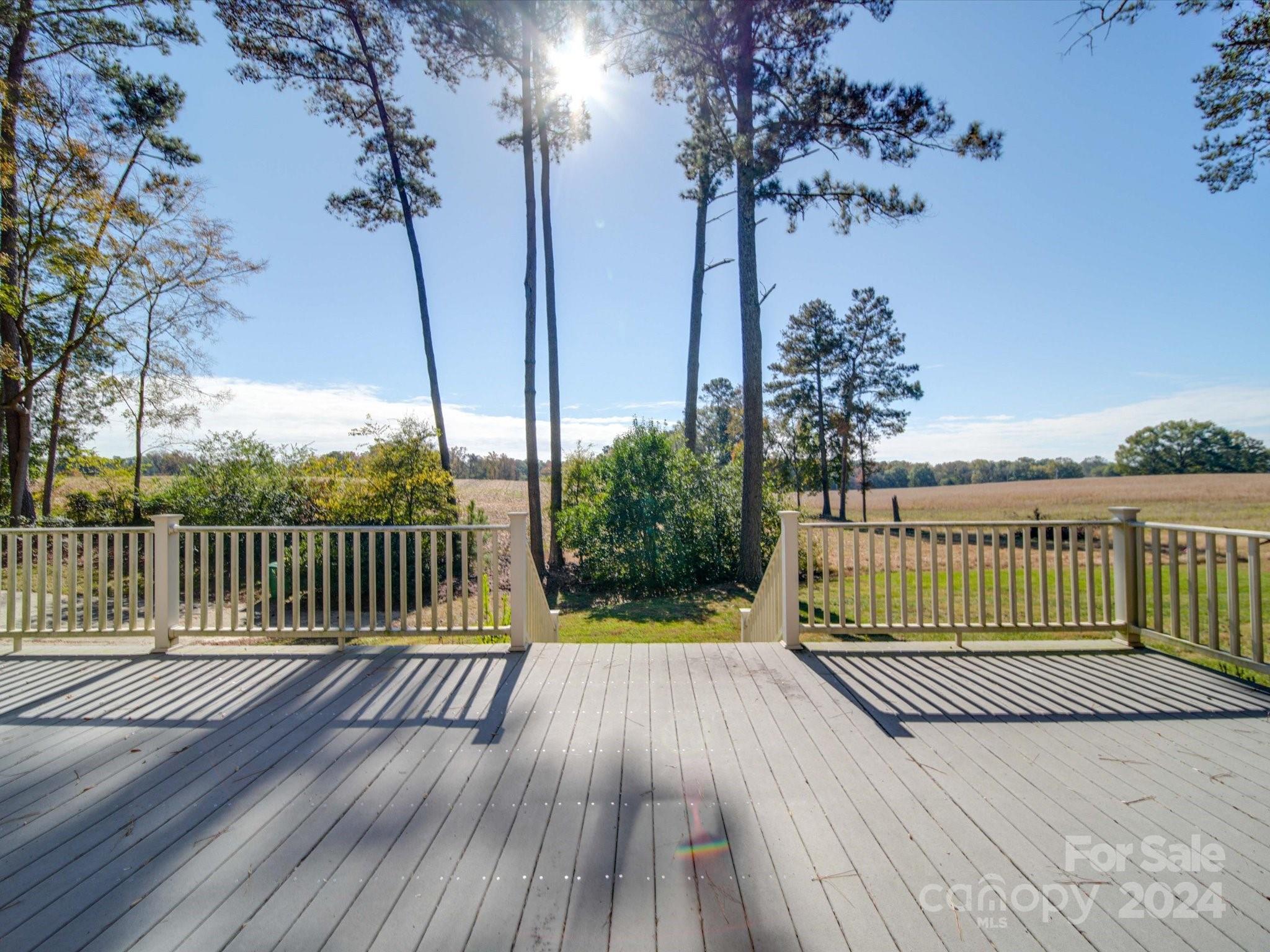 205 James Road Oakboro, NC 28129 - Photo 8 of 48 a view of balcony with wooden floor and fence