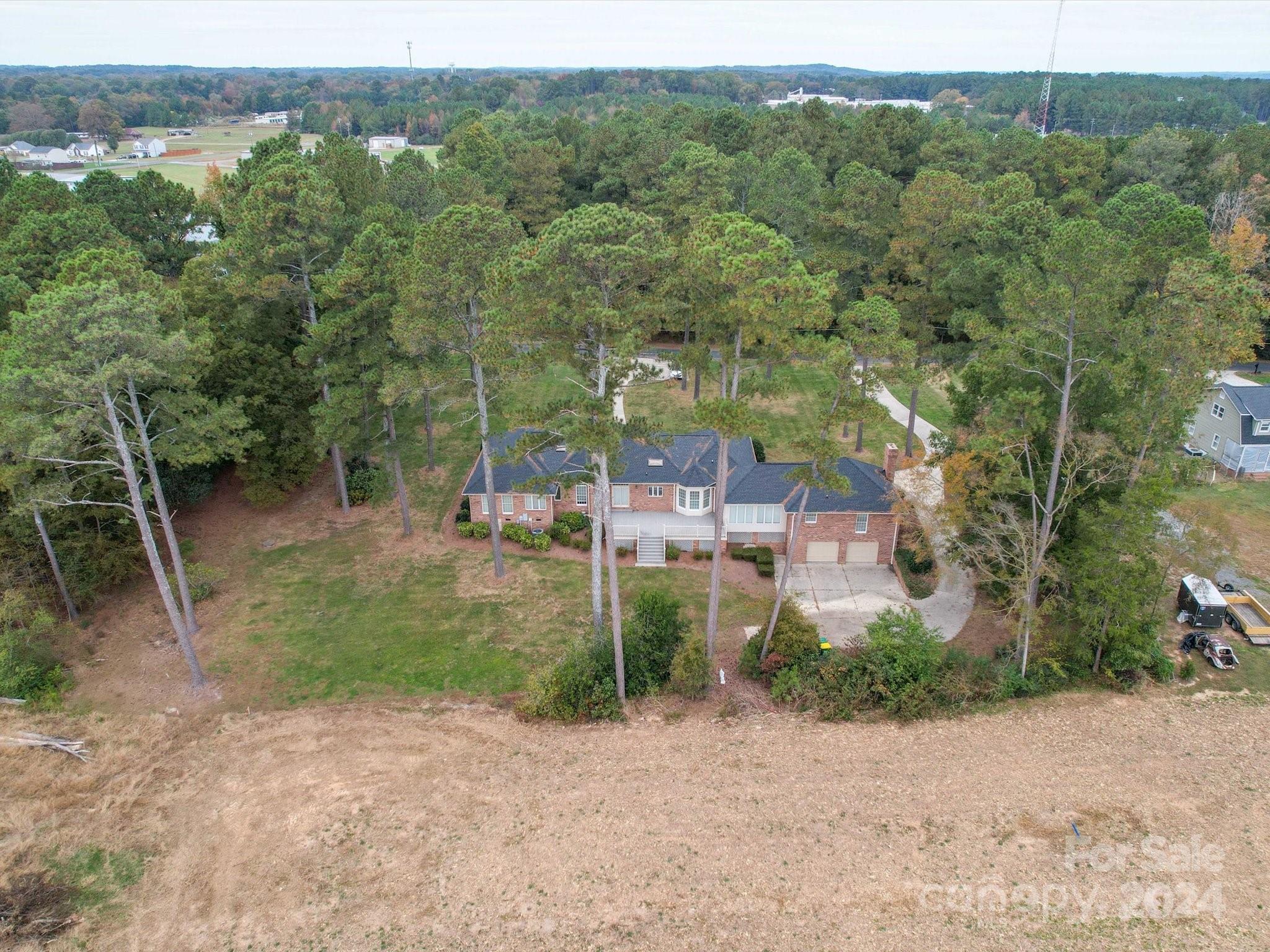 205 James Road Oakboro, NC 28129 - Photo 9 of 48 an aerial view of a house with a yard