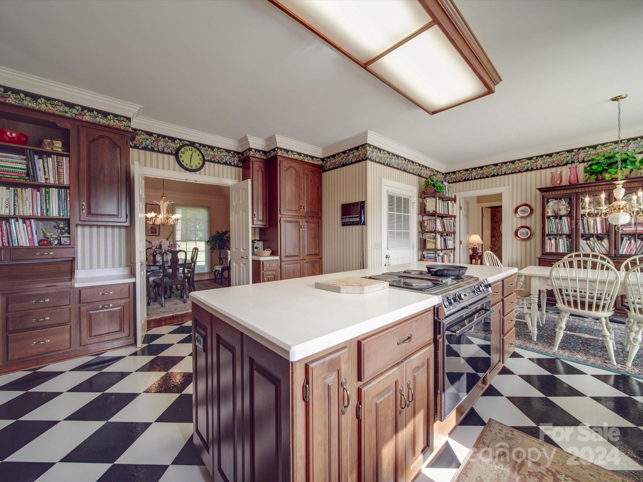 205 James Road Oakboro, NC 28129 - Photo 10 of 48 a large white kitchen with a stove a sink and a refrigerator