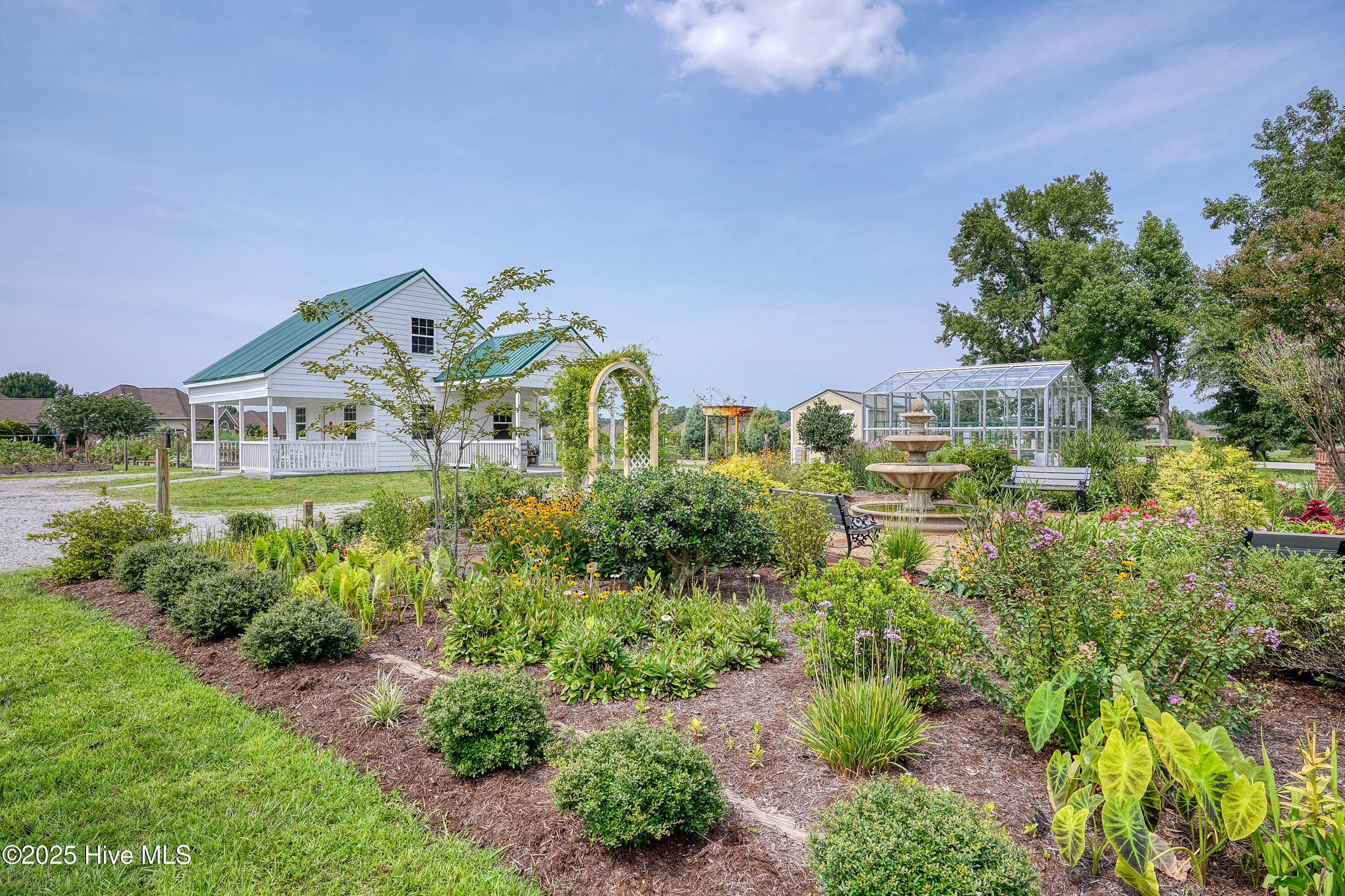 513 Cliffside Point Southwest Ocean Isle Beach, NC 28469 - Photo 20 of 25 Plantation Gardens Archway and Greenhous