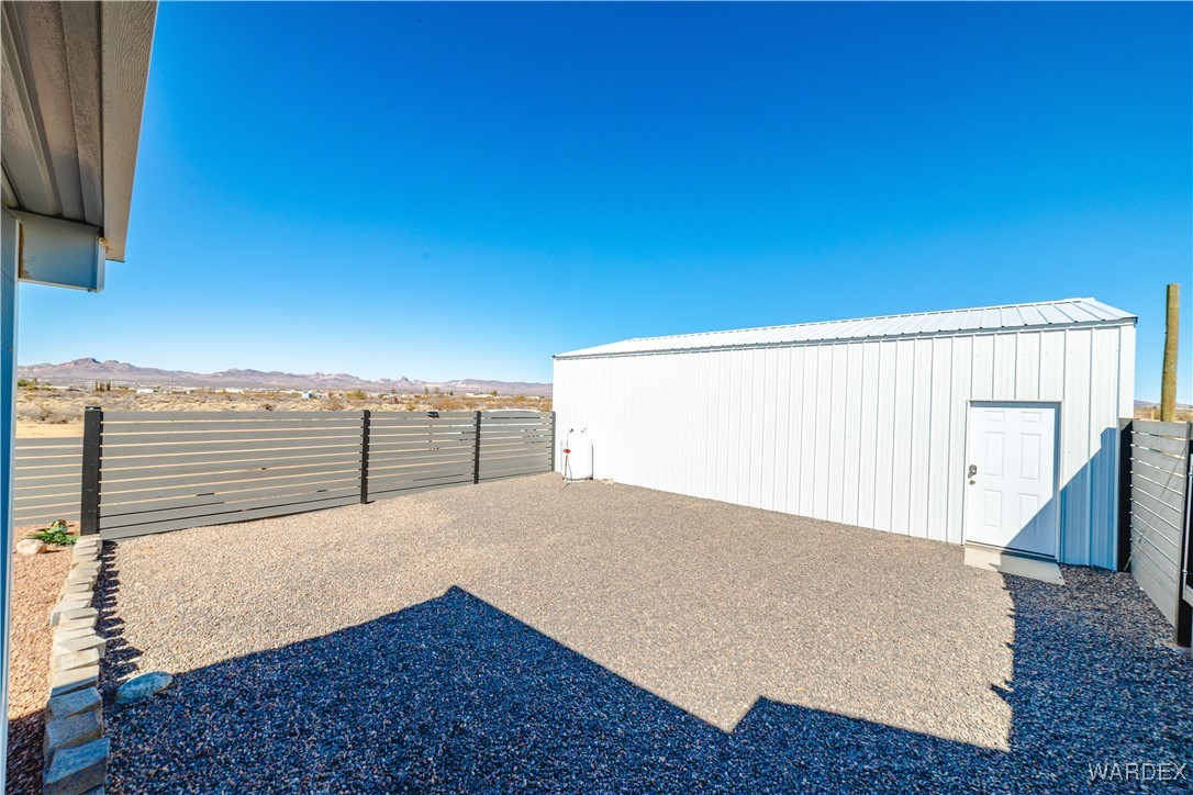 561 South La Osa Road Golden Valley, AZ 86413 - Photo 43 of 58 Side of Structure