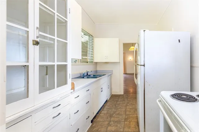 a room with a bed and a view of bathroom