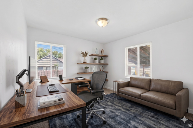 7879 Oak Street Midvale, UT 84047 - Photo 13 of 32 Bright room with white painted walls, two windows, and a flush mount ceiling light
