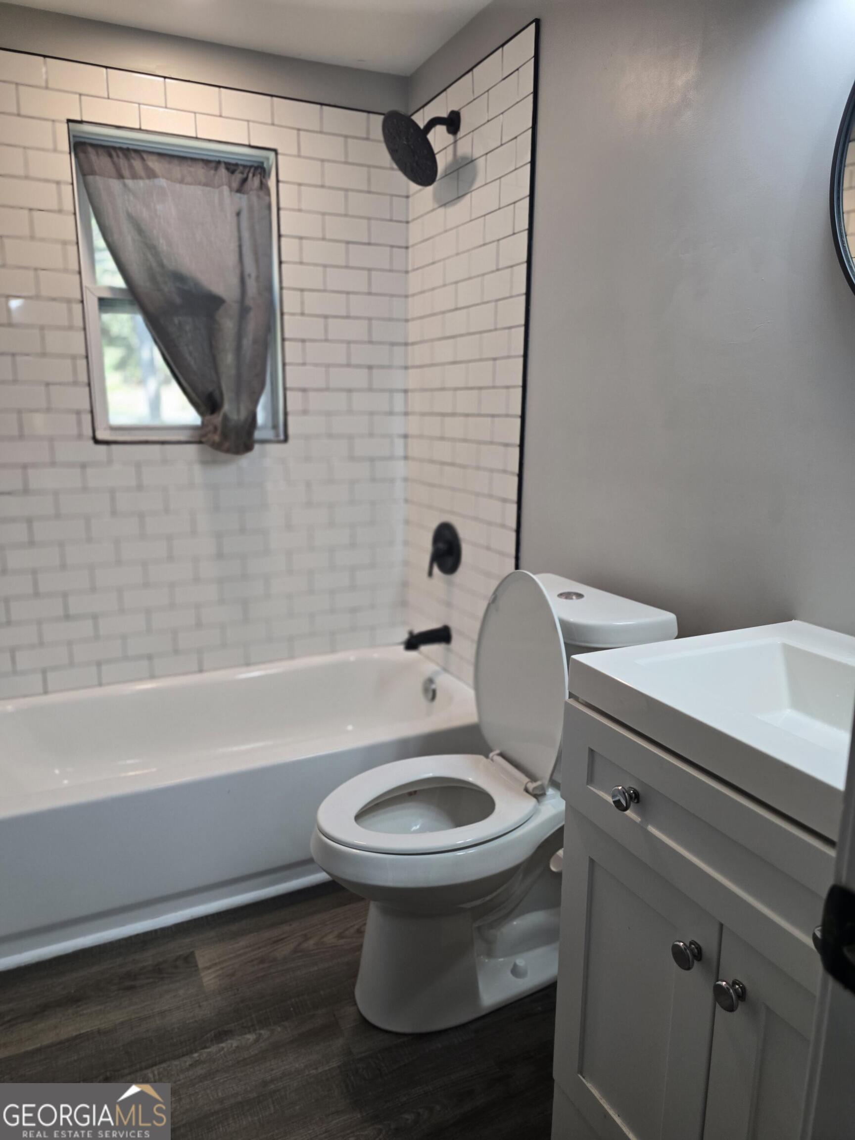 1109 Liberty Church Road Bremen, GA 30110 - Photo 19 of 26 a bathroom with a toilet a sink and bathtub