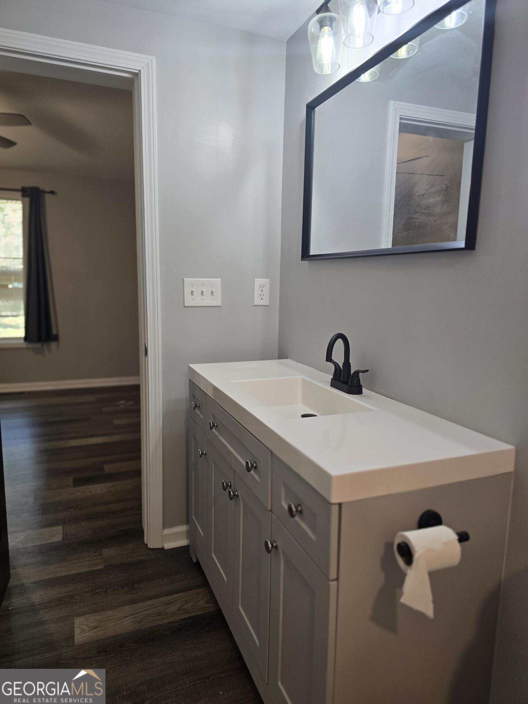 1109 Liberty Church Road Bremen, GA 30110 - Photo 21 of 26 a kitchen with a sink and a mirror