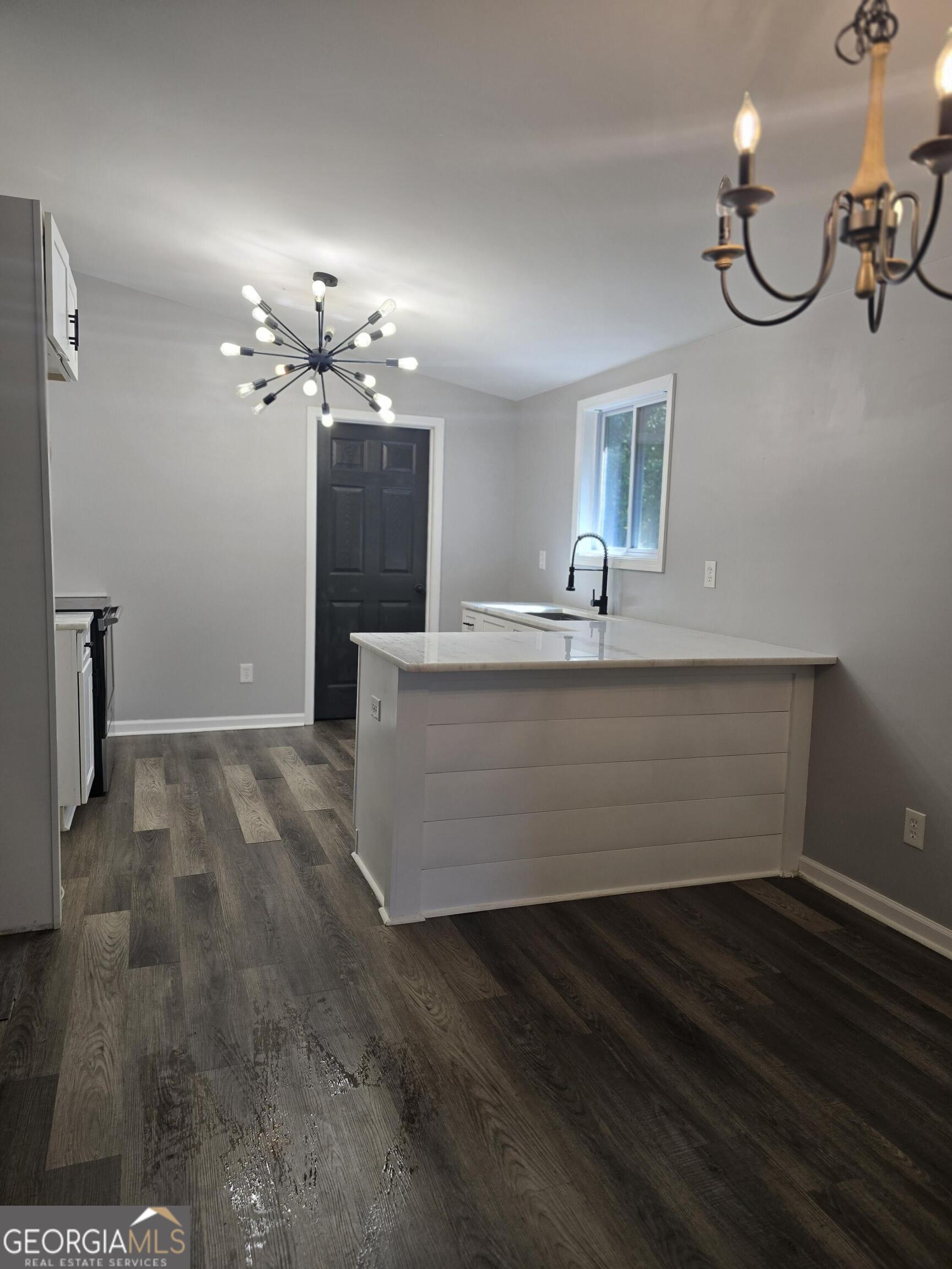 1109 Liberty Church Road Bremen, GA 30110 - Photo 24 of 26 a view of a room with a ceiling fan and wooden floor